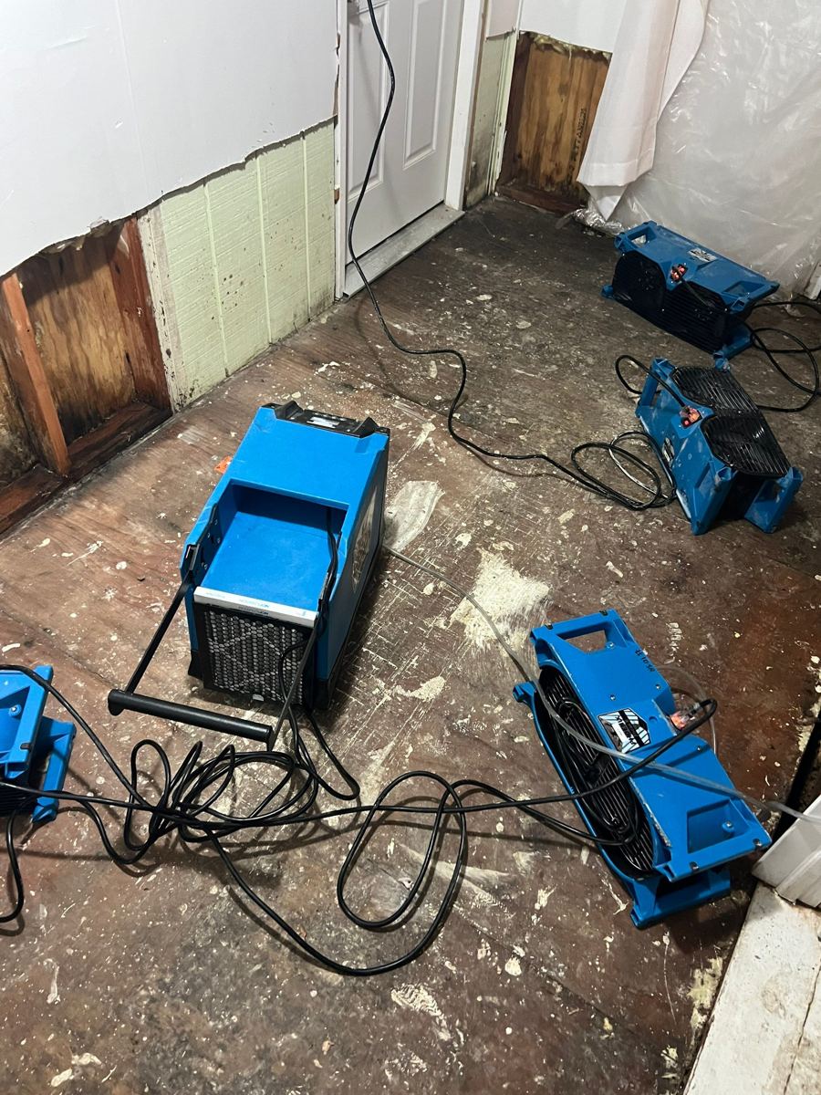Commercial dehumidifiers pulling moisture out of the structure
